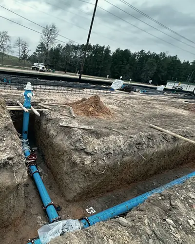 A new water line in an open trench